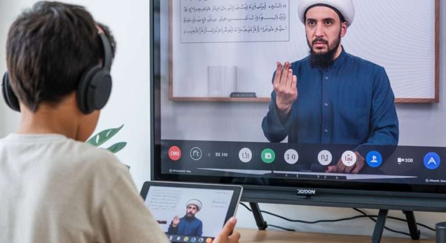 Boy learning Quran online at home in Australia
